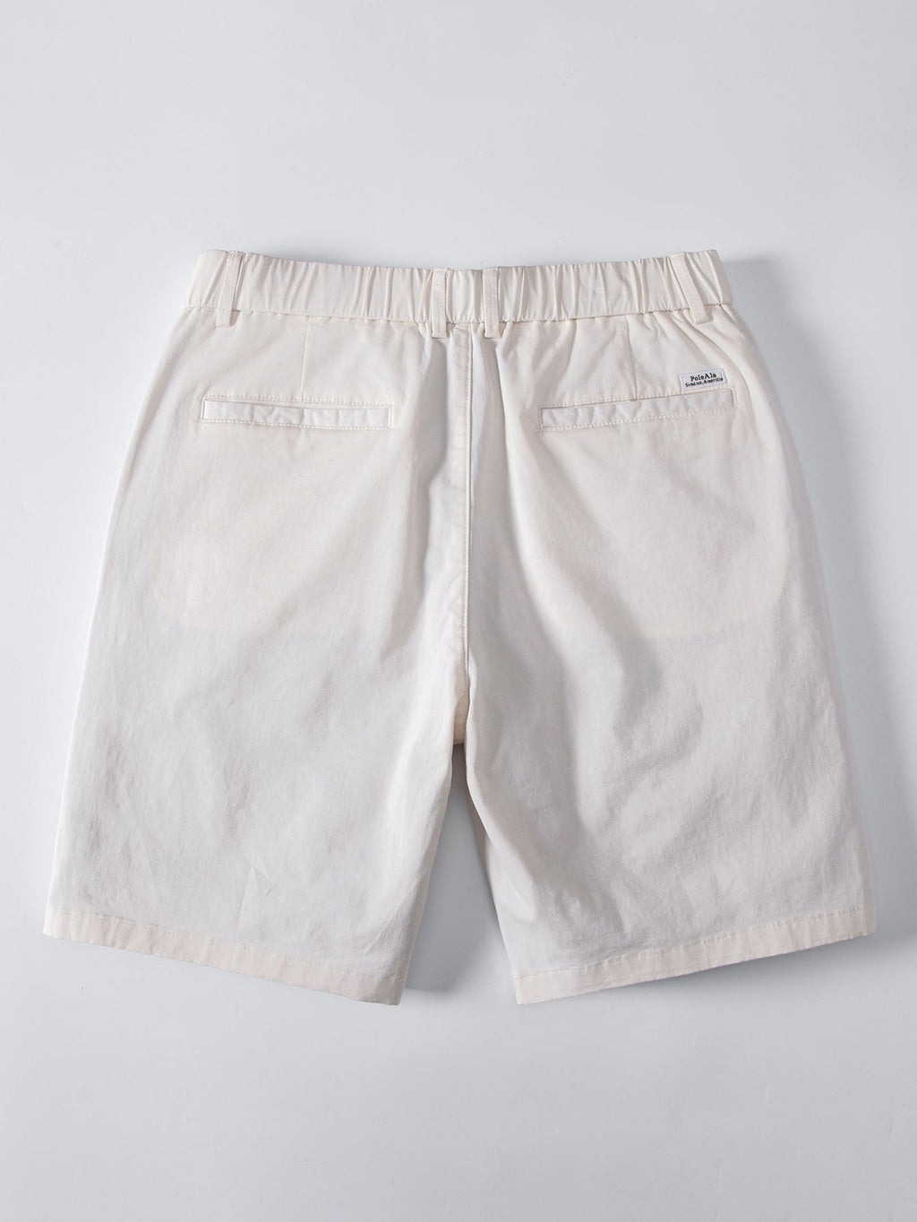 Vaaleat beiget chino-shortsit takaa