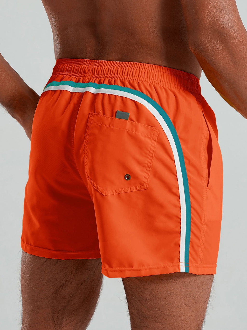 Oranssien uimashortsien yksityiskohta