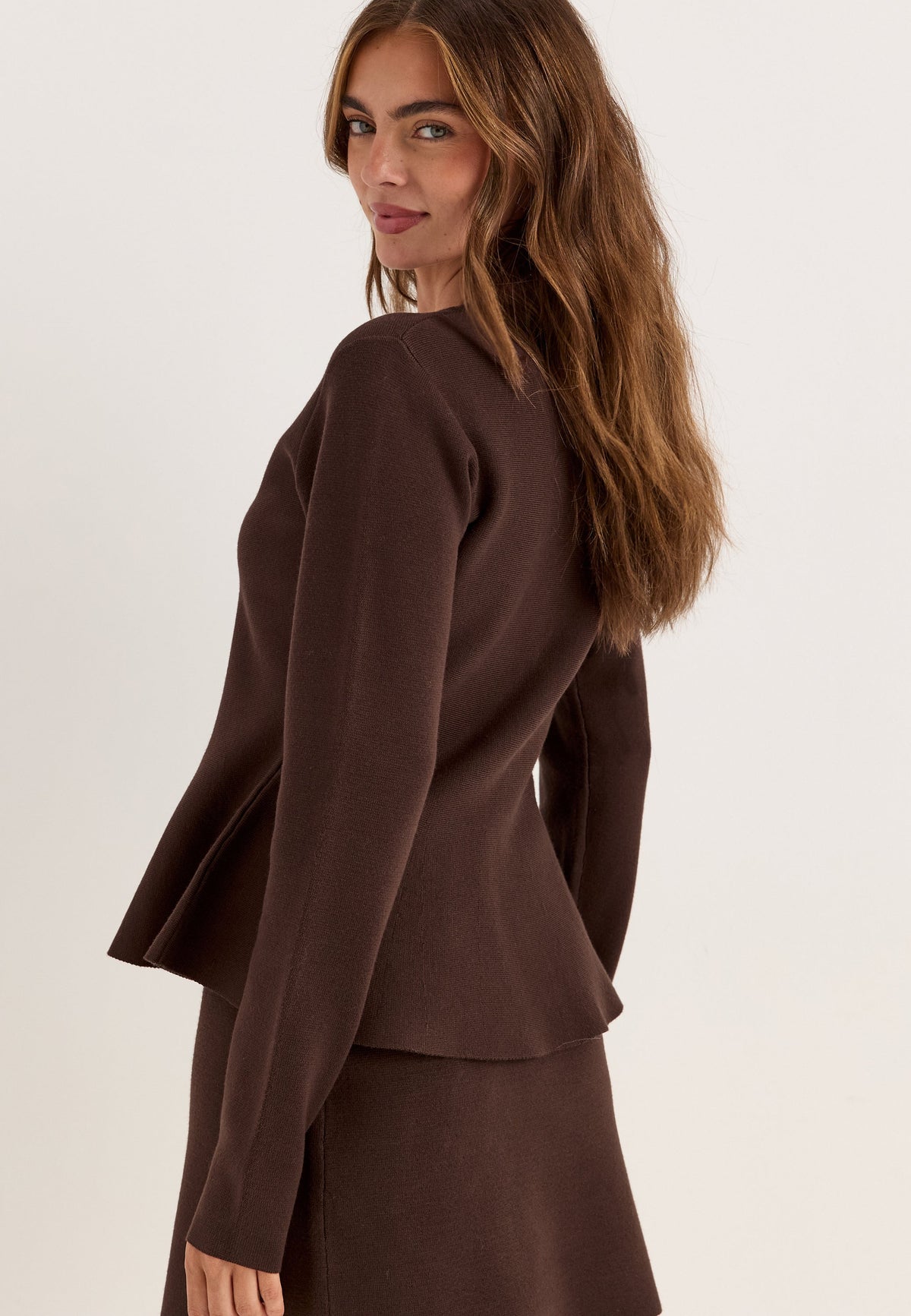 Pleteni peplum kardigan