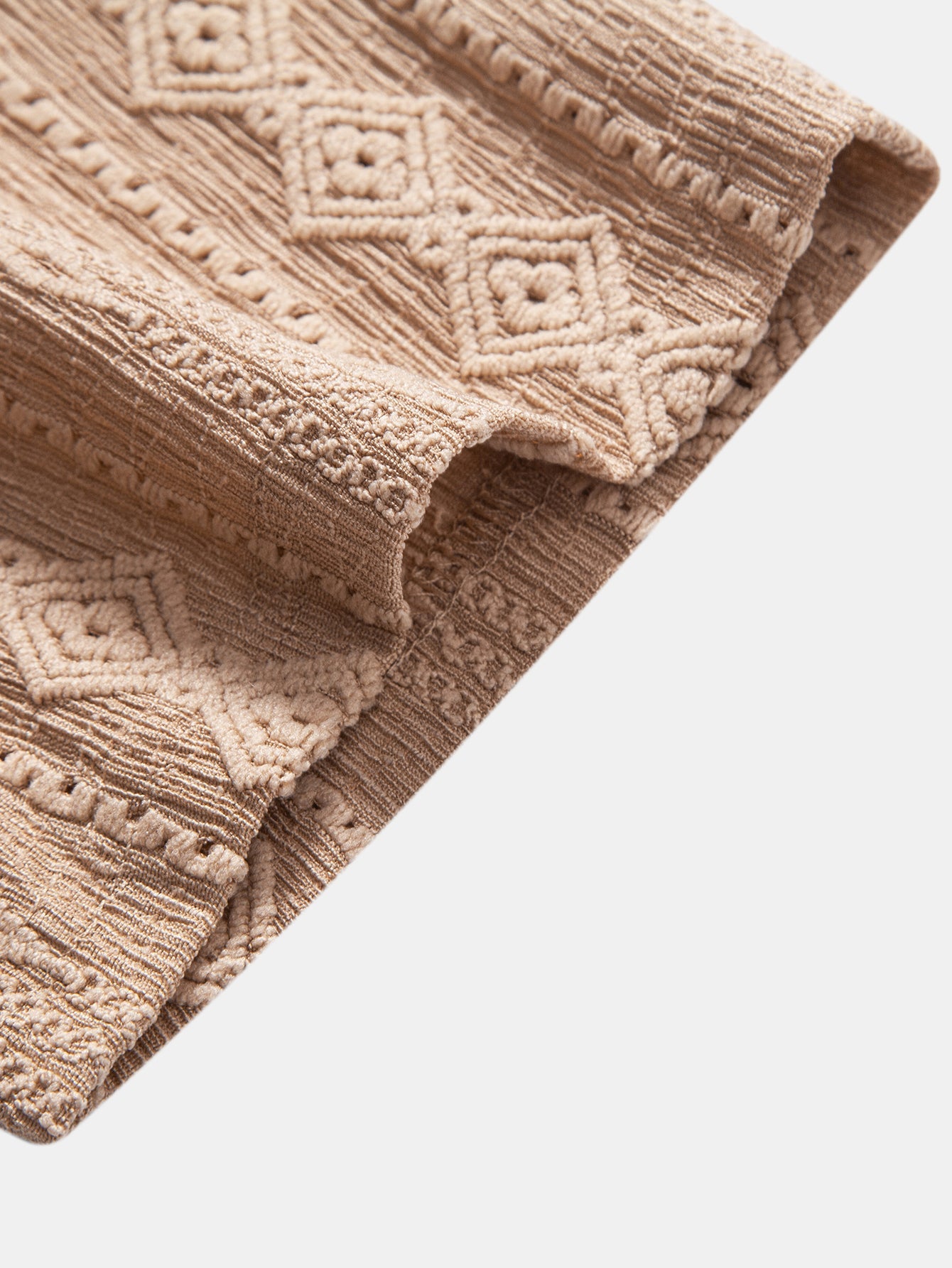 Vaaleanruskean jacquard-pikeepaidan hihansuu