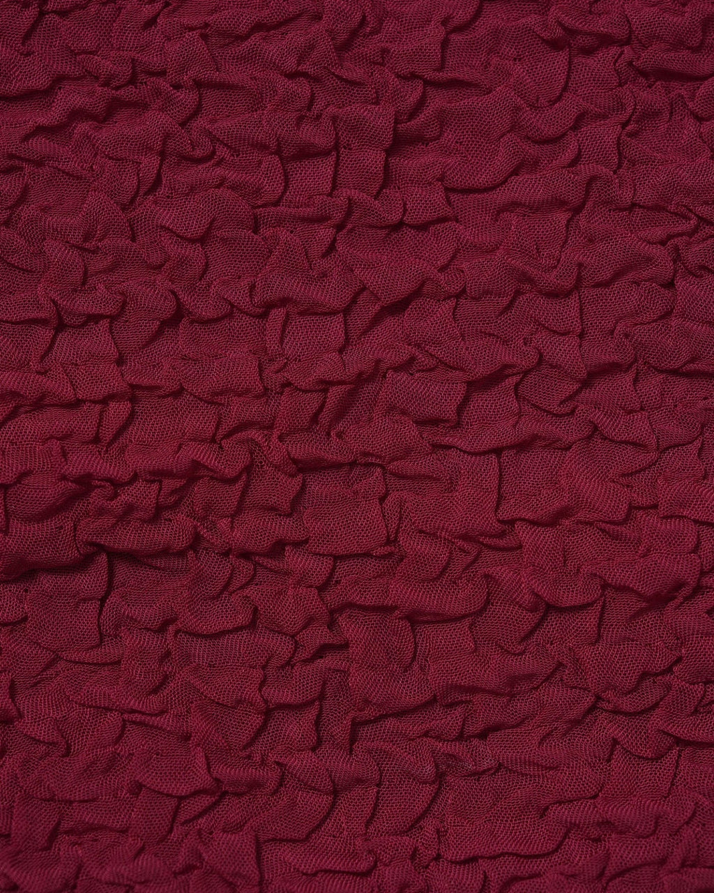 Viininpunaisten bikinien jacquard-kuosin ja materiaalin yksityiskohta