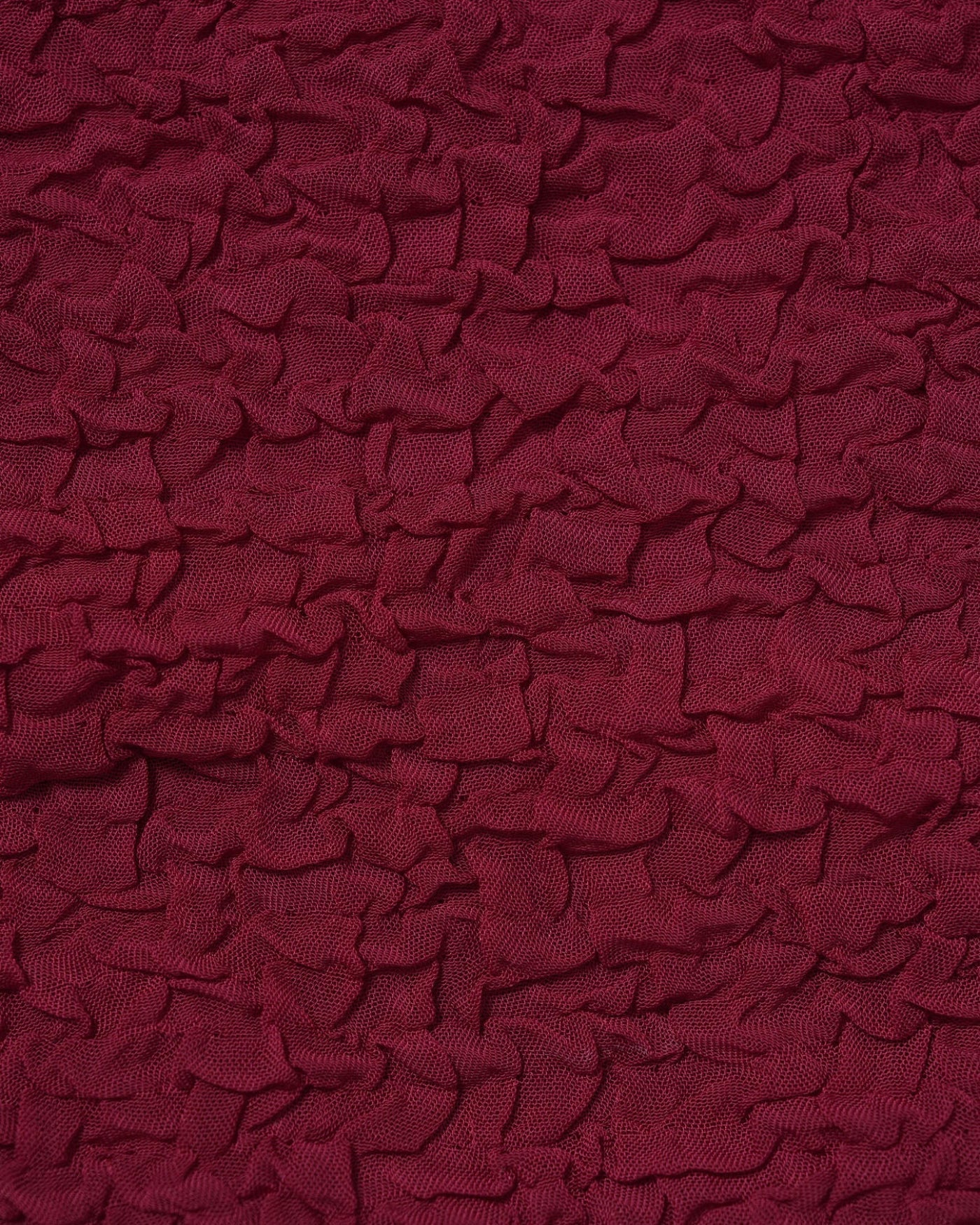 Viininpunaisten bikinien jacquard-kuosin ja materiaalin yksityiskohta